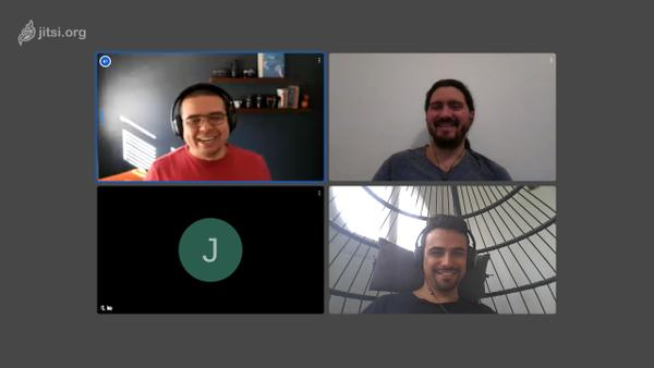 Screenshot of a video call in Jitsi, showing four participants, David, Nico, Jacob, and Andre, some of which are laughing or smiling